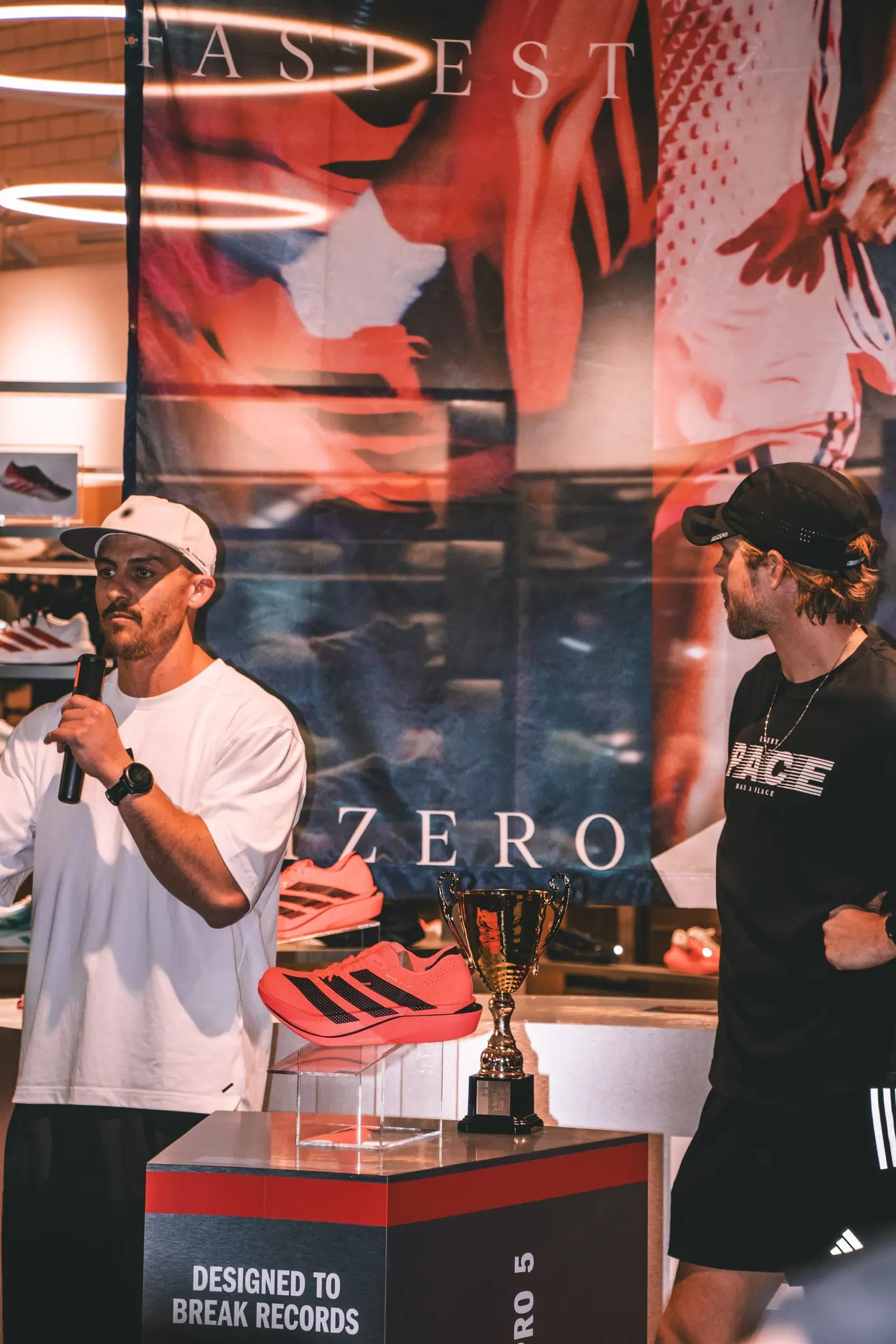 The Mentmore Mile race briefing at House of Rec, with the trophy and an Adizero Adios Pro 5 on display