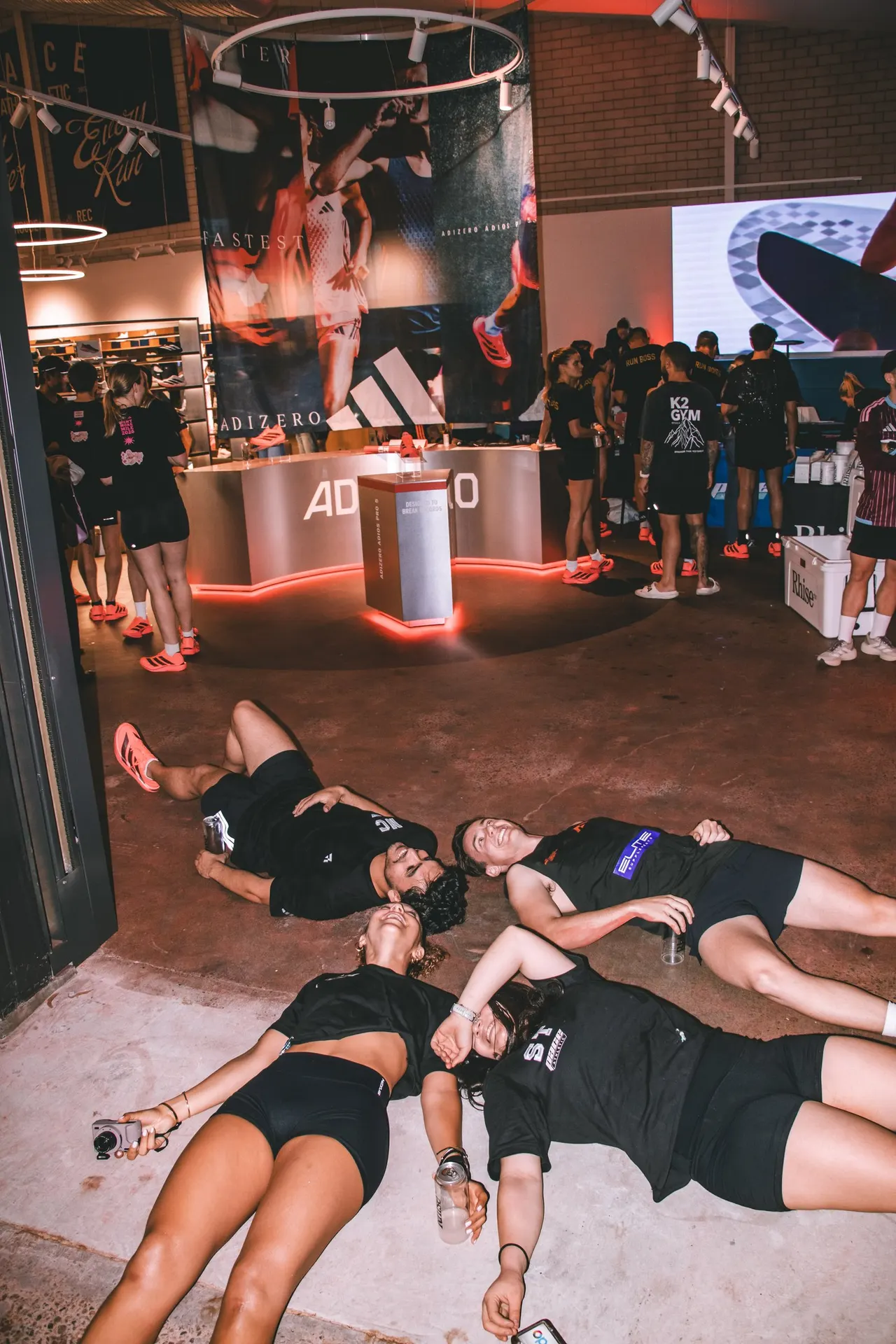 Runners lying on the floor of House of Rec after racing the Mentmore Mile