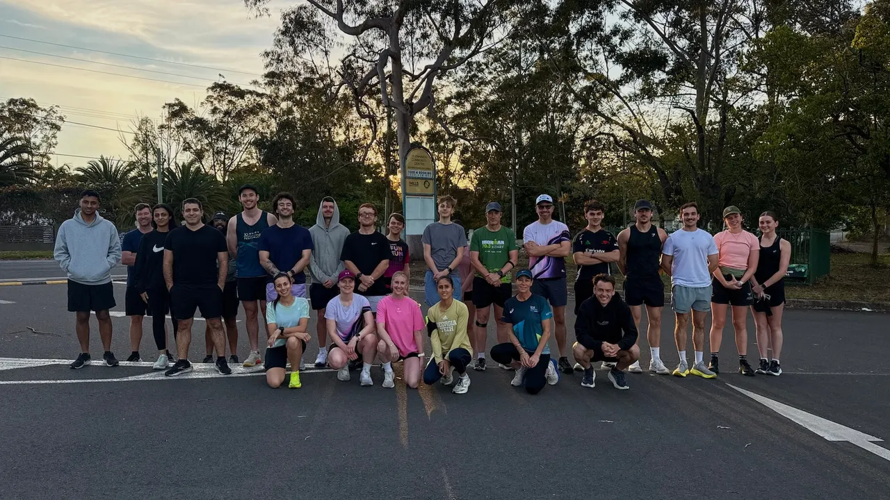 Runners gathering at Glenhaven Oval before the Hills Run Club Thursday morning run